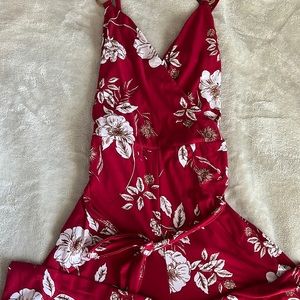Red flower jump suit, great for the summer or family functions